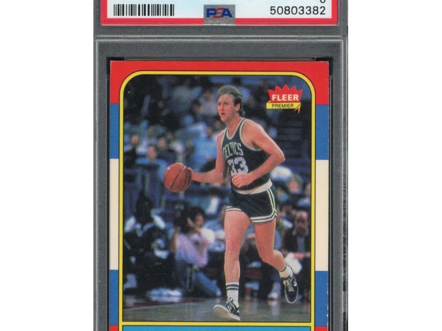 1986 Fleer Larry Bird #33 Celtics basketball card – Near Mint condition with iconic green/yellow Fleer border