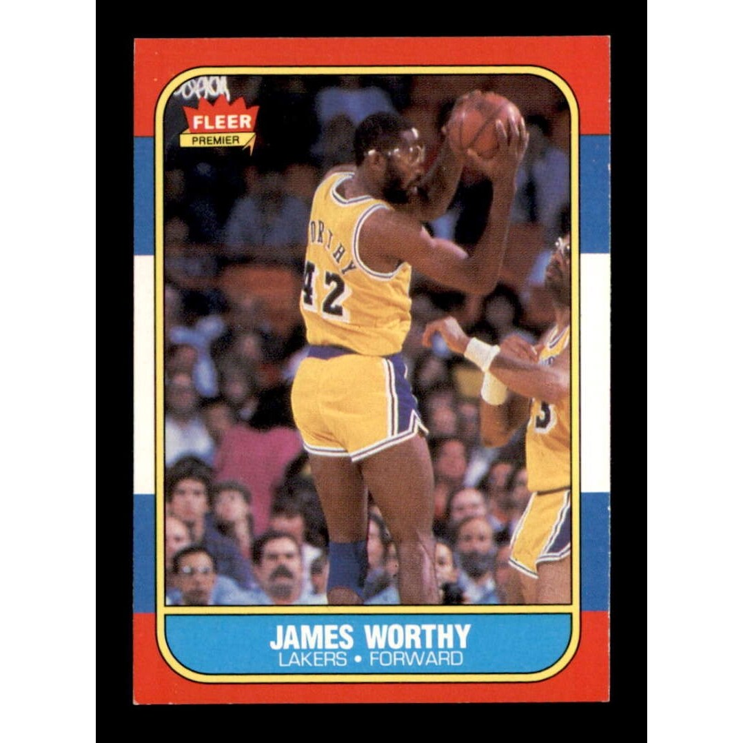 1986 Fleer James Worthy # 42 Lakers basketball card – Near Mint condition with iconic green/yellow Fleer border